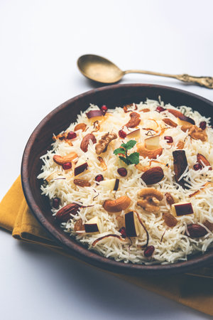 Kashmiri pulao made of Basmati rice cooked with spices and flavored with Saffron and dry fruitsの写真素材
