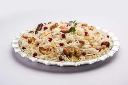Kashmiri pulao made of Basmati rice cooked with spices and flavored with Saffron and dry fruitsの写真素材