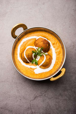Malai Kofta CurryÂ is an indian cuisine dish with potato cottage cheese fried balls in onion tomato gravy with spicesの写真素材