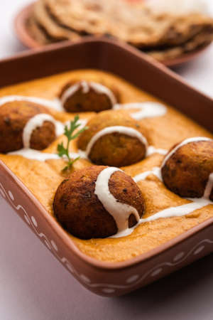 Malai Kofta CurryÂ is an indian cuisine dish with potato cottage cheese fried balls in onion tomato gravy with spicesの写真素材