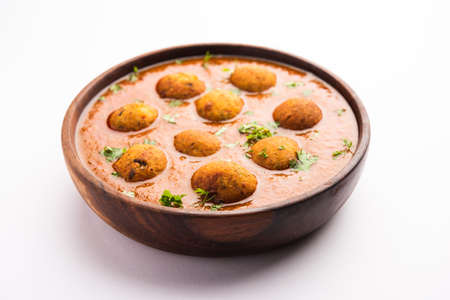 Malai Kofta CurryÂ is an indian cuisine dish with potato cottage cheese fried balls in onion tomato gravy with spicesの写真素材