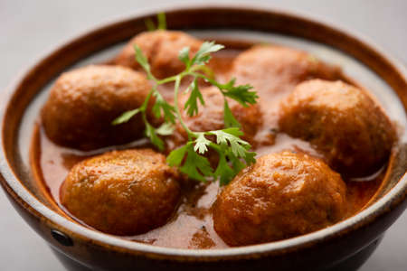 Malai Kofta CurryÂ is an indian cuisine dish with potato cottage cheese fried balls in onion tomato gravy with spicesの写真素材
