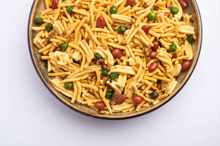 Bombay mix or Chanachur or Chiwda or farsan is an Indian snack mix, popular tea-time food from India