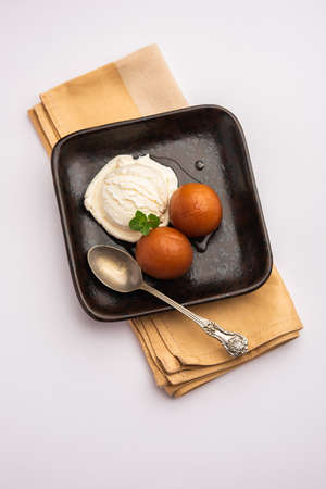 Gulab Jamun Traditional Indian Dessert served with Vanilla Ice Cream