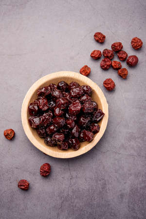Indian jujube, berry or ber boiled in jaggery syrup with sweet and sour taste called Labdo, typical...