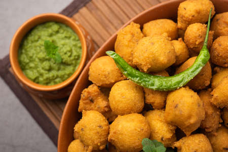 Monsoon special Moong Dal Vada, Pakoda, Dalwada, Pakora or Mungdal Bhajiya or Yellow Split Gram...
