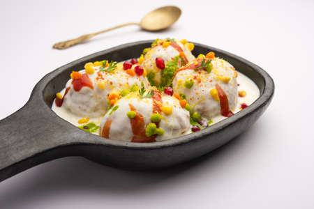 Dahi vada or bhalla is a type of chaat originating from the Indian and popular throughout South...