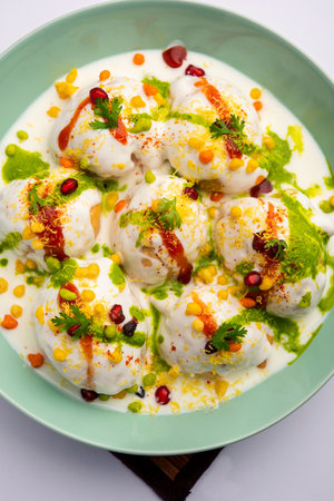 Dahi vada or bhalla is a type of chaat originating from the Indian and popular throughout South...