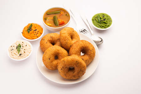 Vada or Medu vadai with sambar and chutney - Popular South Indian snack or breakfast
