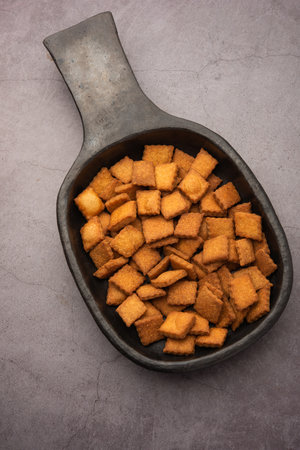 shakkarpara or shankarpali or shankarpaleÂ is diamond shape Traditional homemade indian gujarati...