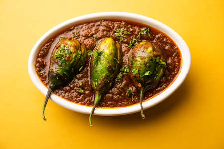 Brinjal curry also known as spicy baingan or eggplant masala, a popular main course recipe from...