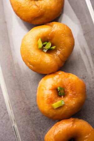Balushahi or Badushah or Mughlai dish is a traditional Indian soft and flaky dessert  or sweet food...