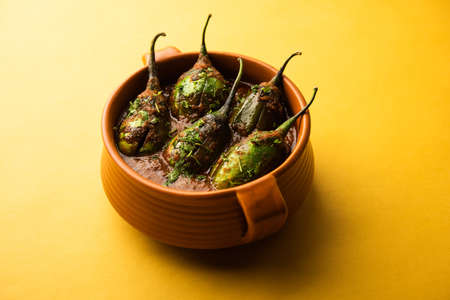 Brinjal curry also known as spicy baingan or eggplant masala, a popular main course recipe from...