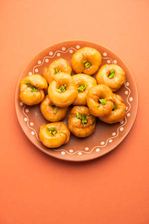 Balushahi or Badushah or Mughlai dish is a traditional Indian soft and flaky dessert  or sweet food...