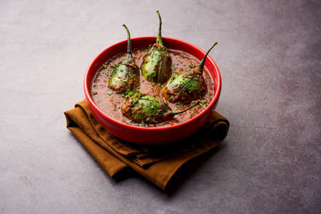 Brinjal curry also known as spicy baingan or eggplant masala, a popular main course recipe from...