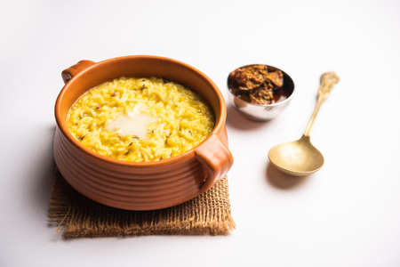 Dal Khichdi Fry With Ghee served in a bowl. Tasty Indian one pot meal. selective focusの写真素材