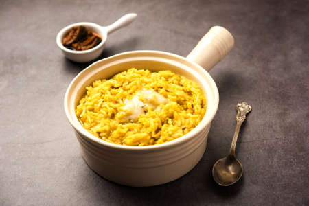 Dal Khichdi Fry With Ghee served in a bowl. Tasty Indian one pot meal. selective focusの写真素材