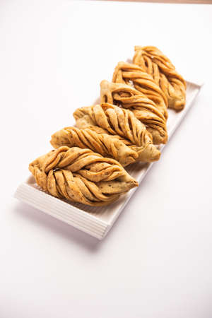 Leaf shapeÂ or laccha Mathri or mathiya is a Rajasthani tea time snack. It's a fried flaky biscuit...