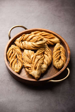 Leaf shapeÂ or laccha Mathri or mathiya is a Rajasthani tea time snack. It's a fried flaky biscuit...