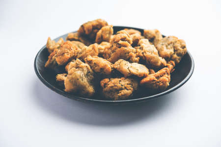 Palak or Methi Mathri - Salted Fenugreek or spinach leaves mixed Crackers are popular in Indiaの写真素材