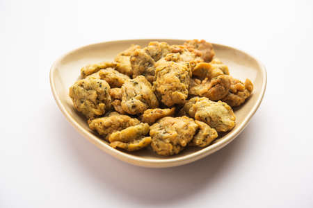 Palak or Methi Mathri - Salted Fenugreek or spinach leaves mixed Crackers are popular in Indiaの写真素材