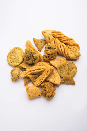 Mathri or Mathiya in group. It's a popular Indian tea time snack