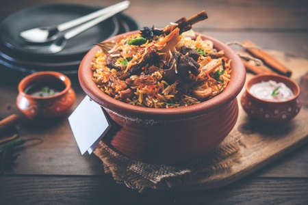 Dum Handi MuttonÂ BiryaniÂ or gosht pilaf is prepared in an earthen or clay pot called Haandi or 1 kilo size. Popular Indian non vegetarian foodの写真素材