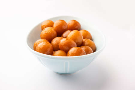 Gulab jamun is a milk-solid-based sweet dumpling popular in India, pakistanÂ in festivals like Diwali, eid or even wedding partiesの写真素材