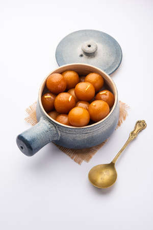 Gulab jamun is a milk-solid-based sweet dumpling popular in India, pakistanÂ in festivals like Diwali, eid or even wedding partiesの写真素材