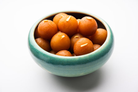 Gulab jamun is a milk-solid-based sweet dumpling popular in India, pakistanÂ in festivals like Diwali, eid or even wedding partiesの写真素材