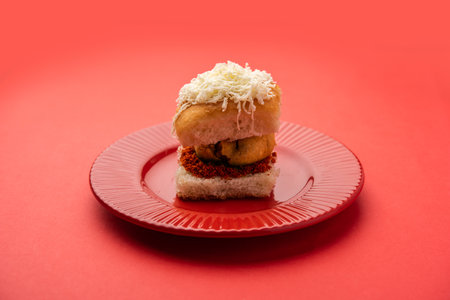 Cheese Vada pav or Grated cheese Wada Pao, popular Bombay snack foodの写真素材