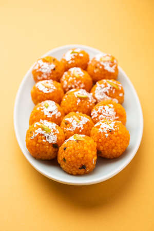 indian sweet motichoor laddooÂ or Bundi laddu made of gram flour very small balls or boondis which...