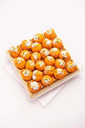 indian sweet motichoor laddooÂ or Bundi laddu made of gram flour very small balls or boondis which are deep fried and soaked in sugar syrup before making ballsの写真素材