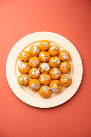 indian sweet motichoor laddooÂ or Bundi laddu made of gram flour very small balls or boondis which are deep fried and soaked in sugar syrup before making ballsの写真素材