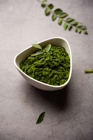 curry leaves or kadi patta chutney in a bowl