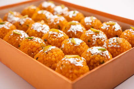 indian sweet motichoor laddooÂ or Bundi laddu made of gram flour very small balls or boondis which are deep fried and soaked in sugar syrup before making ballsの写真素材