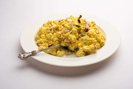 Saffron flavoured Kalakand is an Indian sweet made out of solidified, sweetened milk and paneerの写真素材