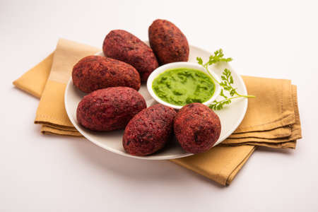 Beet Root Patties or cutlet or tikki served with green chutneyの写真素材