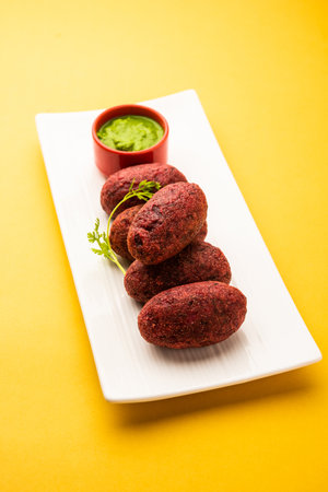 Beet Root Patties or cutlet or tikki served with green chutneyの写真素材
