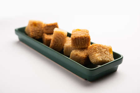 Indian Milk Cake kalakand or Alwar ka Mawa sweet served in a plate