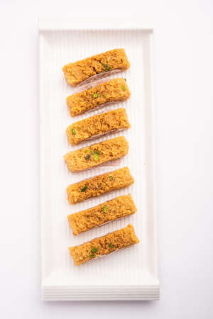 Indian Milk Cake kalakand or Alwar ka Mawa sweet served in a plateの写真素材