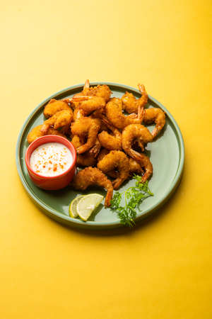 shrimp fritters or prawn bajji or jheenga pakodaÂ or kolambi or zinga pakora, Indian snack food
