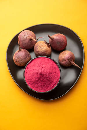 Heap of Beetroot or Beet Root powder with raw whole contains the essential minerals iron, potassium, and magnesiumの写真素材