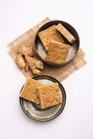 Aale Pak or Ginger Barfi or candy or Adrak barfee or burfi is a traditional Indian medicine for cough and coldの写真素材