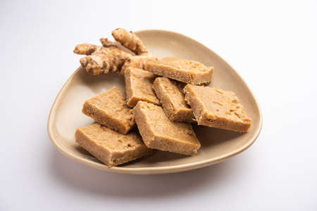 Aale Pak or Ginger Barfi or candy or Adrak barfee or burfi is a traditional Indian medicine for cough and coldの写真素材