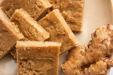 Aale Pak or Ginger Barfi or candy or Adrak barfee or burfi is a traditional Indian medicine for cough and coldの写真素材