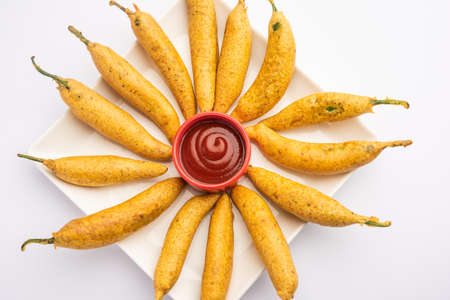 Stuffed Chilli Pakora or mirchi pakoda or mirchi vada, An extremely delicious and mouth watering snack of Pakistani & Indian Peopleの写真素材