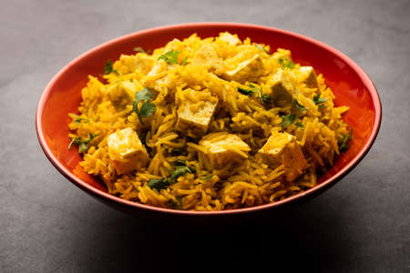 Healthy Paneer Pulav OR Pilaf using Basmati Rice served in a bowl or plate, Indian food