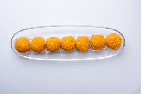indian sweet motichoor laddooÂ or Bundi laddu made of gram flour very small balls or boondis which...