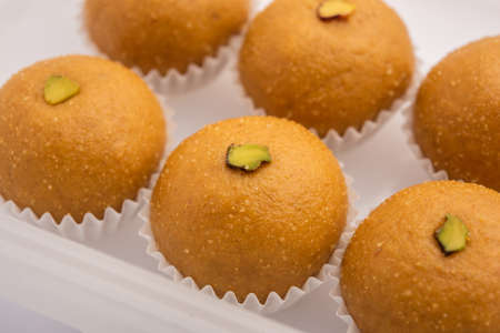 Besan ladoo are delicious sweet balls made with gram flour, sugar, ghee & cardamoms